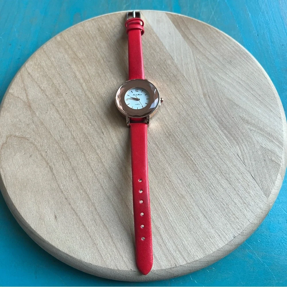 Kaidi Mann ladies rose gold tone red watch NEW BATTERY